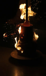 Clay and molten glass