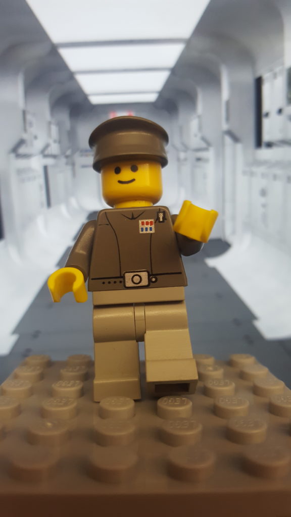 A LEGO minifigure from the 2001 Star Wars Final Duel II Lego set. The figure is dressed as an Imperial Officer.