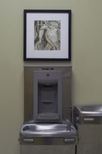 Art above drinking fountain