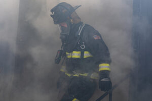 A firefighter student exits the Flashover Simulator at the 37th CITA Kirkwood Fire School on Sept. 23-24-2023.