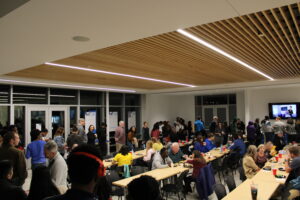 Family, friends and students gather to try foods from all across the world at the Intercultural Festival potluck dinner on Nov. 17, 2023.