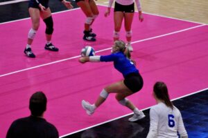 No. 5 Ava Morris goes in for a dig during the National Championship in Cedar Rapids at the Alliant Energy PowerHouse.
