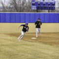 Runner rounds the base