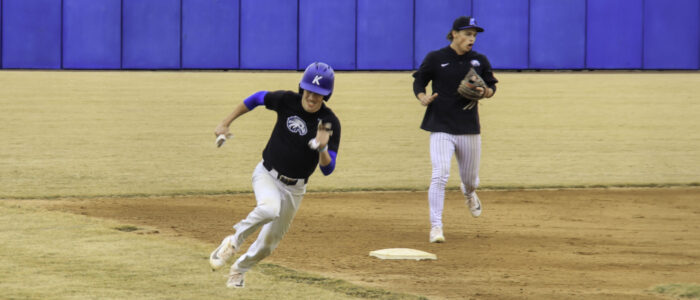 Runner rounds the base