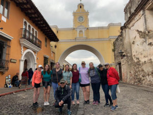 Photo of Kirkwood students under the Santa Catalina Arch in Antigua, Guatemala.